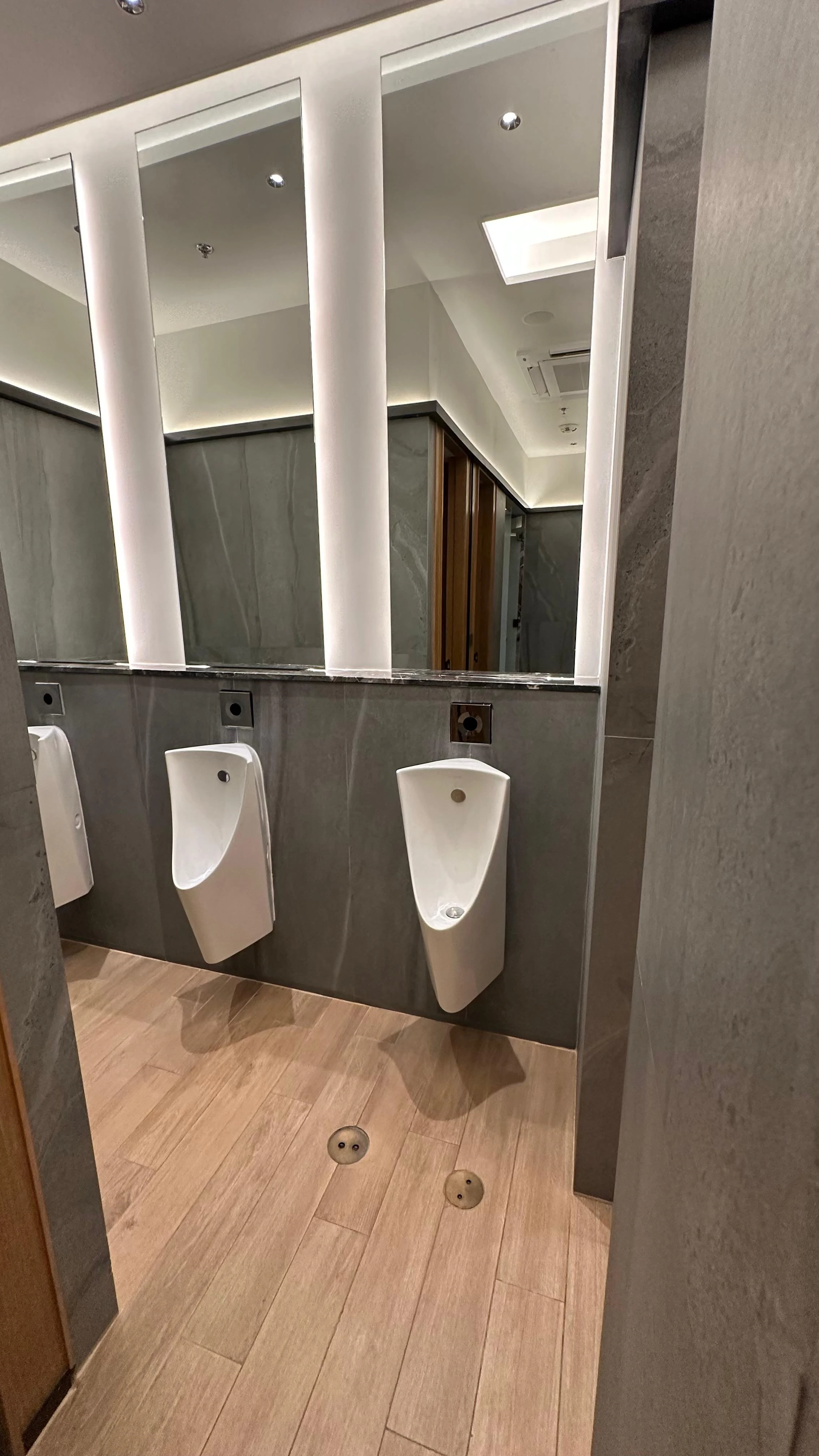 Illuminated bathroom mirrors